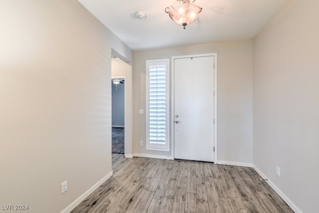 entrance foyer with light hardwood / wood-style floors