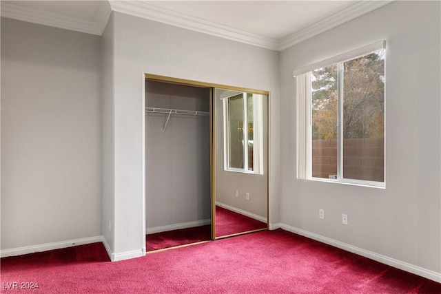 unfurnished bedroom featuring a closet, carpet floors, and ornamental molding