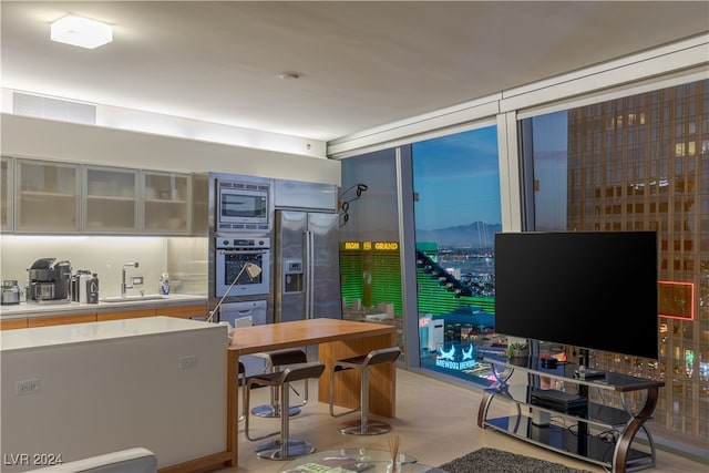 kitchen with sink and appliances with stainless steel finishes