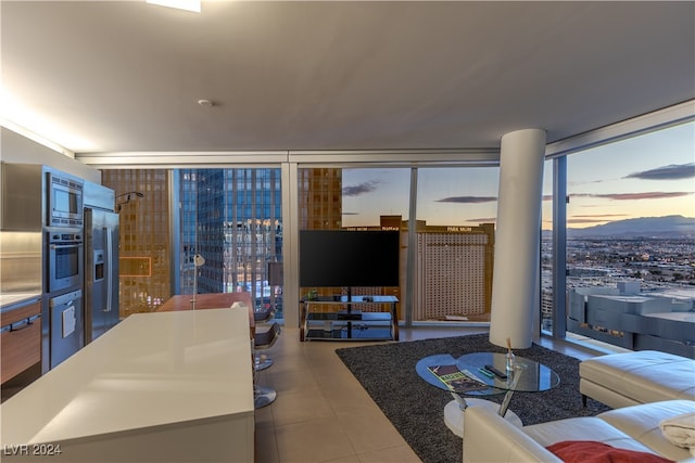 living room with tile patterned flooring