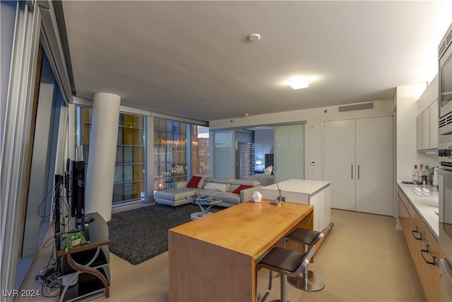 kitchen featuring a center island and a kitchen bar