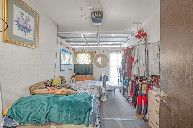 bedroom featuring concrete floors