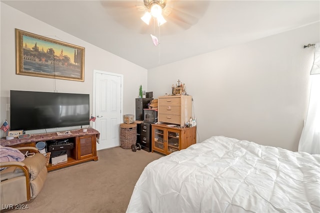 carpeted bedroom with lofted ceiling and ceiling fan