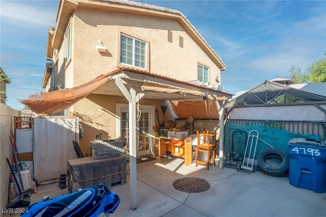 rear view of property with a patio