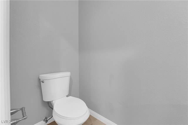 bathroom featuring toilet