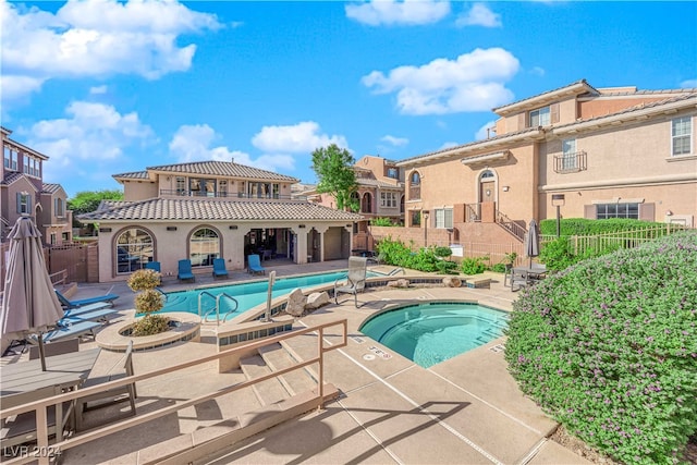 view of pool featuring a patio area