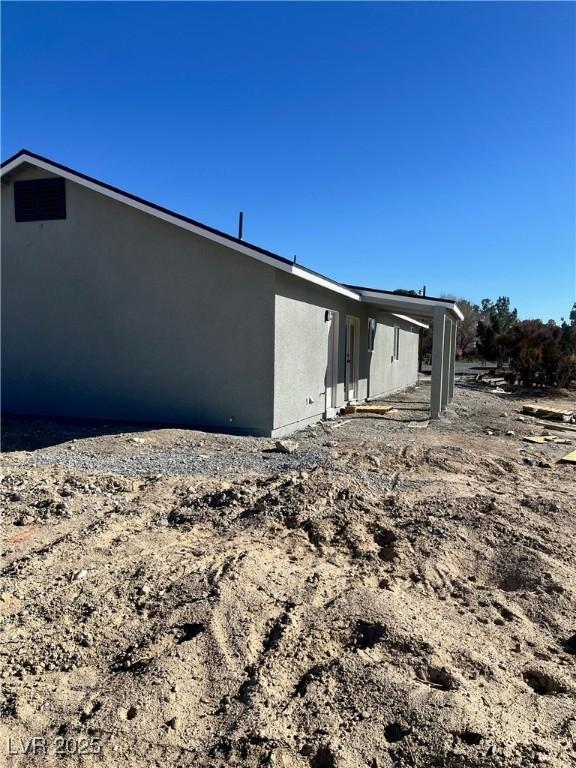 view of home's exterior featuring stucco siding