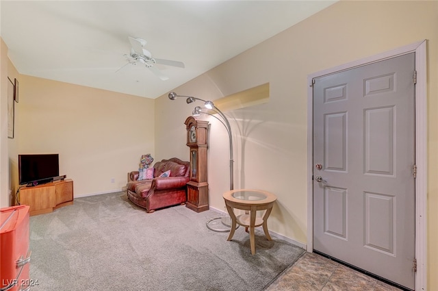 entrance foyer featuring ceiling fan and light colored carpet