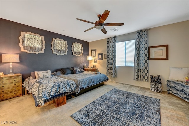 carpeted bedroom featuring ceiling fan