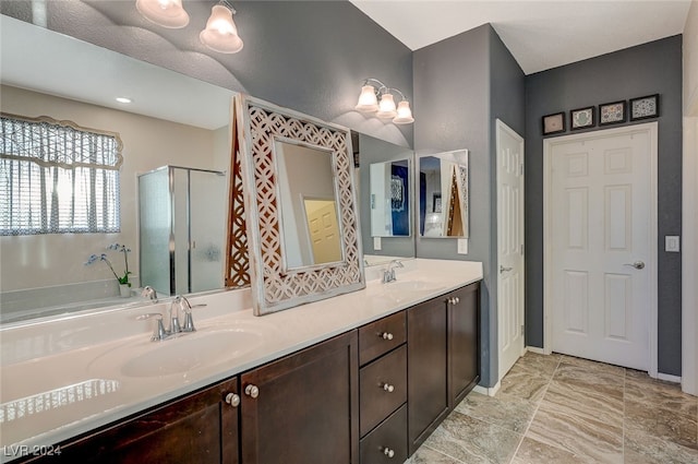 bathroom with vanity and walk in shower