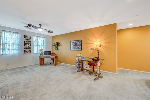 carpeted office with ceiling fan