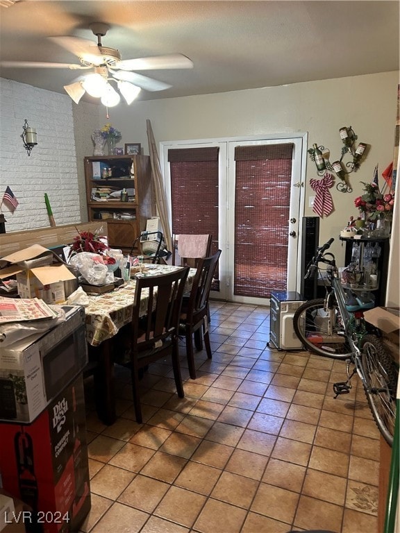 dining room featuring light tile patterned floors and ceiling fan