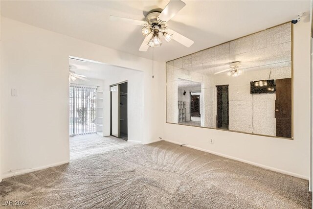 408 Rossmoyne Ave, North Las Vegas, NV 89030 - carpeted empty room featuring a ceiling fan and baseboards