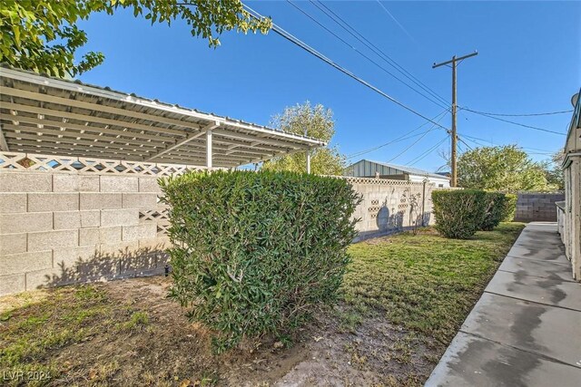 408 Rossmoyne Ave, North Las Vegas, NV 89030 - view of yard featuring a pergola