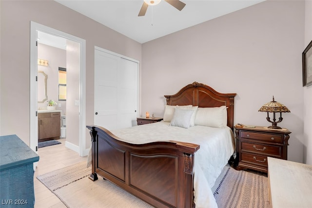 bedroom with connected bathroom, a closet, light hardwood / wood-style floors, and ceiling fan