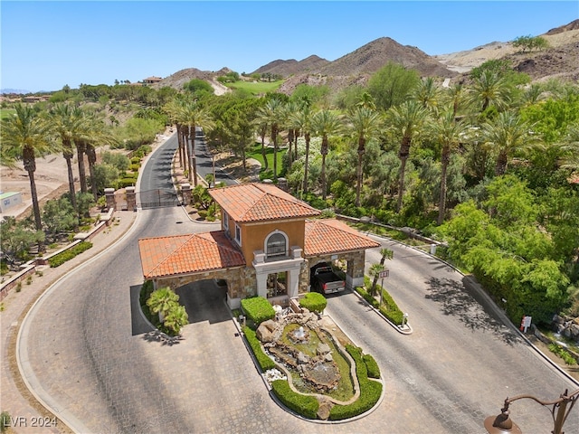 birds eye view of property with a mountain view