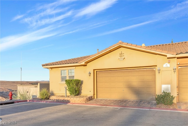 view of front of home featuring a garage