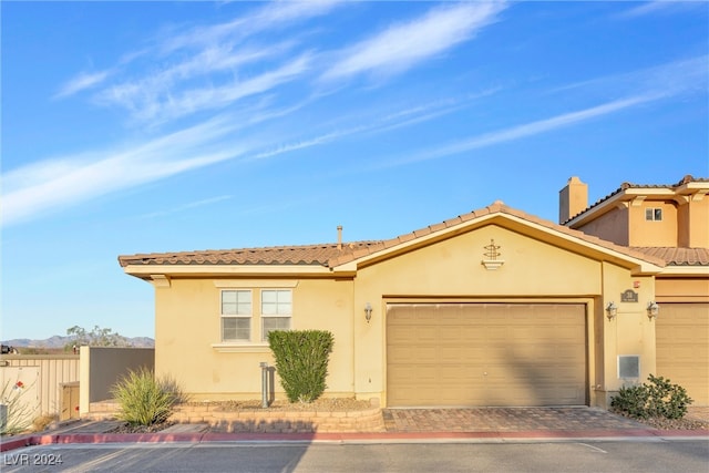 view of front of property featuring a garage