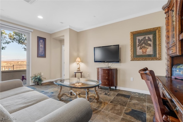 living room featuring crown molding