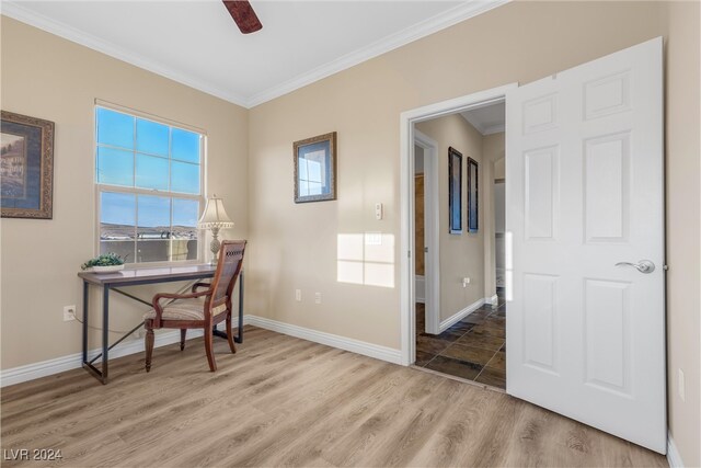 home office with ornamental molding, ceiling fan, and wood-type flooring