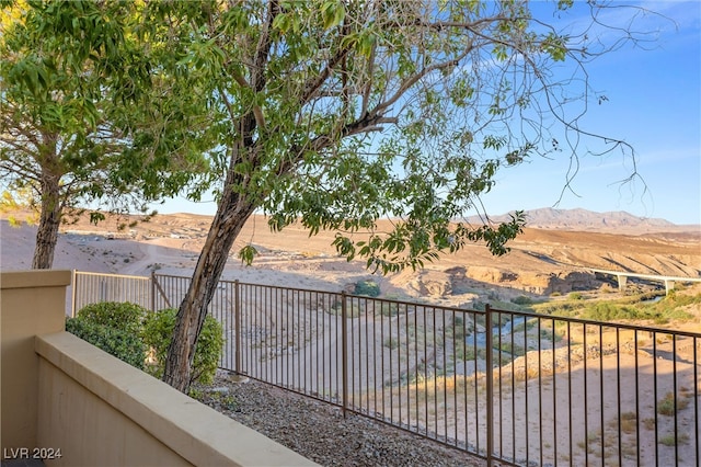 balcony featuring a mountain view