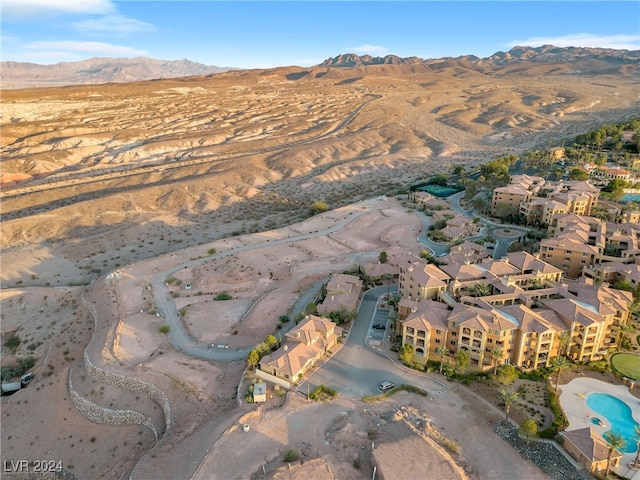 drone / aerial view featuring a mountain view