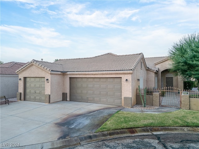 ranch-style house featuring a garage