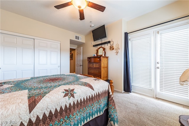 bedroom featuring a closet, ceiling fan, carpet flooring, and access to outside