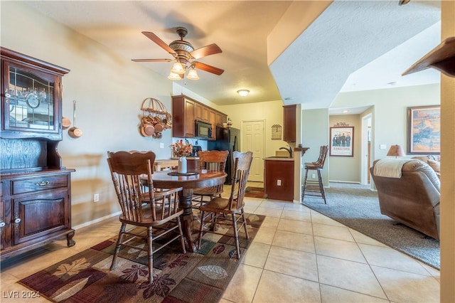 3550 Bay Sands Dr Unit 2082, Laughlin, NV 89029 - dining area with ceiling fan, light tile patterned floors, and baseboards