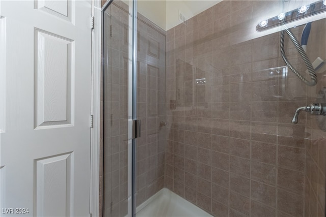 bathroom with walk in shower