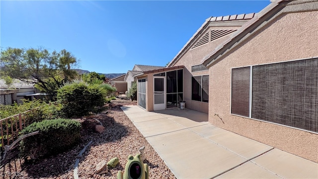 exterior space with a patio area