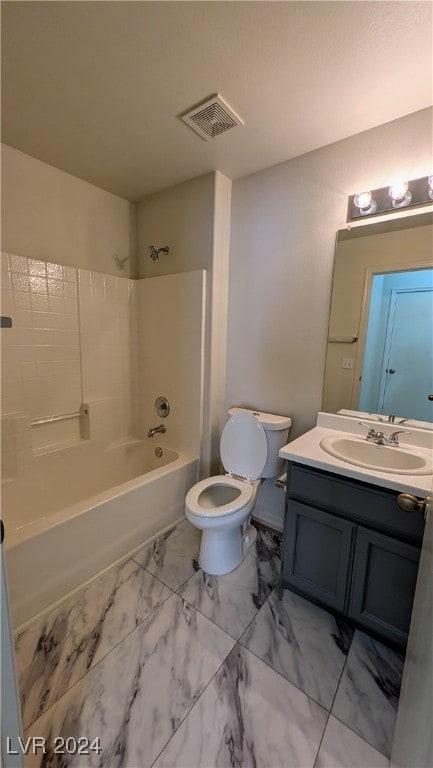 full bathroom featuring tub / shower combination, vanity, and toilet