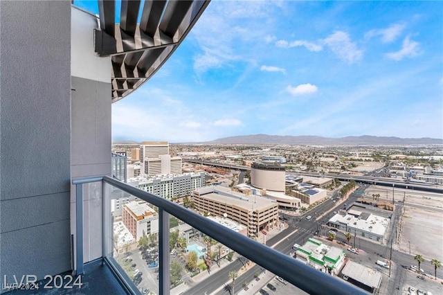 balcony featuring a mountain view