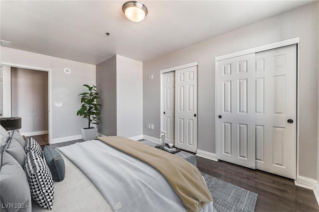 150 Las Vegas Blvd Unit 2512, Las Vegas, NV 89101 - bedroom with two closets and dark wood-style flooring