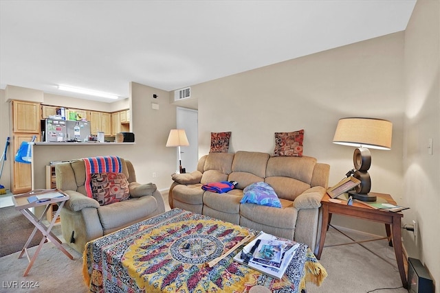 living room with light colored carpet