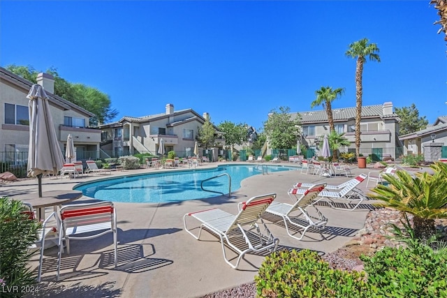 view of pool featuring a patio