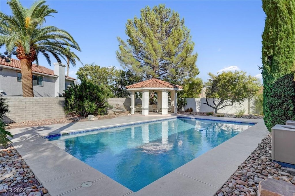 view of swimming pool featuring a gazebo