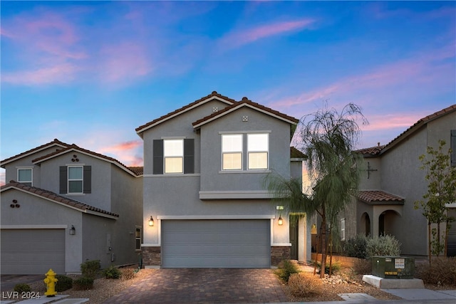 view of front of property with a garage