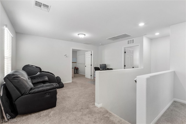 living room featuring light colored carpet