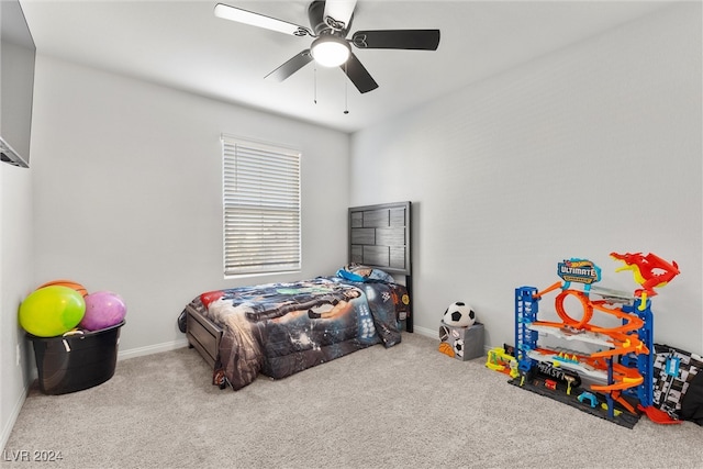 carpeted bedroom featuring ceiling fan