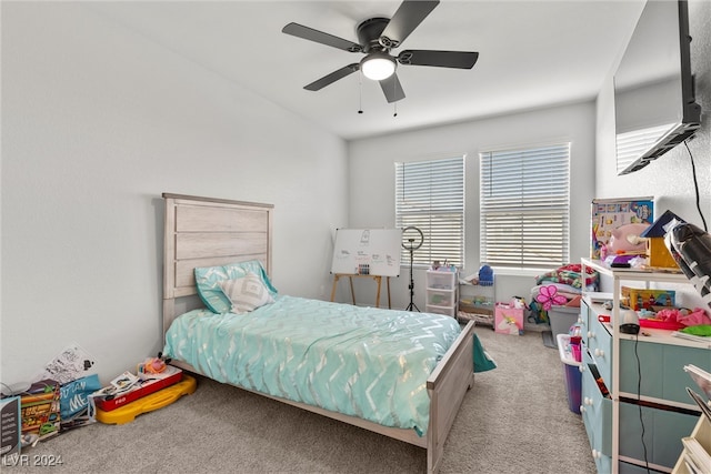 carpeted bedroom with ceiling fan