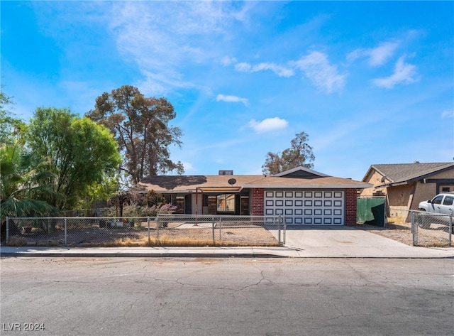 single story home with a garage