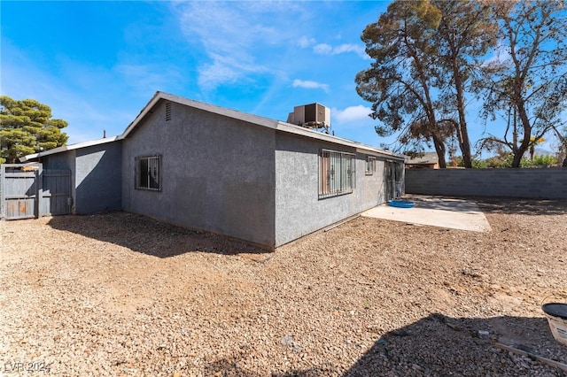 rear view of property with a patio area