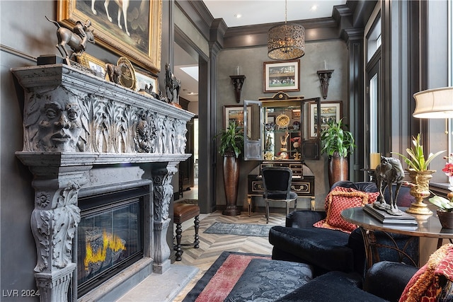 living room featuring light parquet flooring and ornamental molding