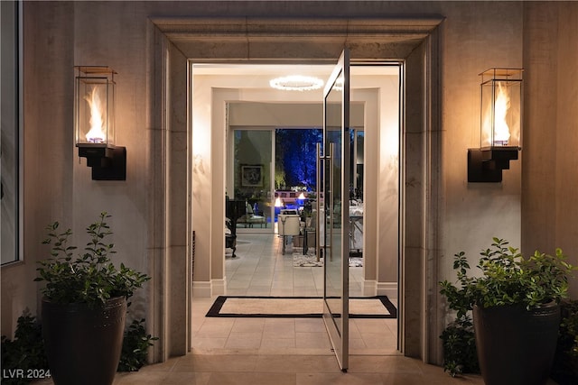 hallway featuring light tile patterned flooring