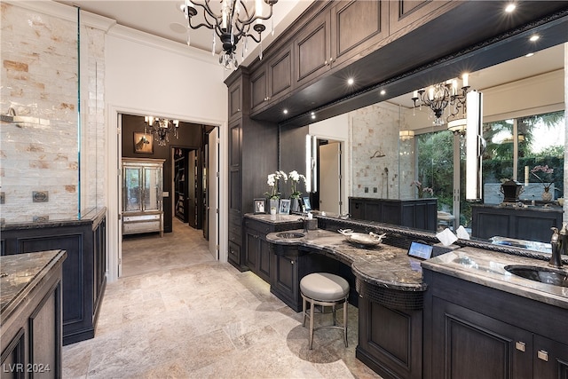 bathroom featuring vanity, walk in shower, and ornamental molding