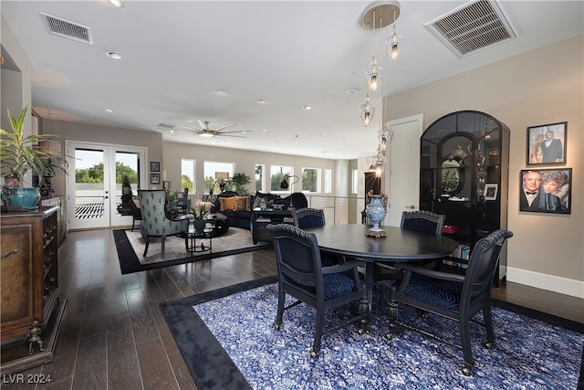 dining space featuring french doors, dark hardwood / wood-style flooring, and ceiling fan