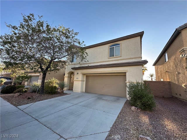 view of property with a garage