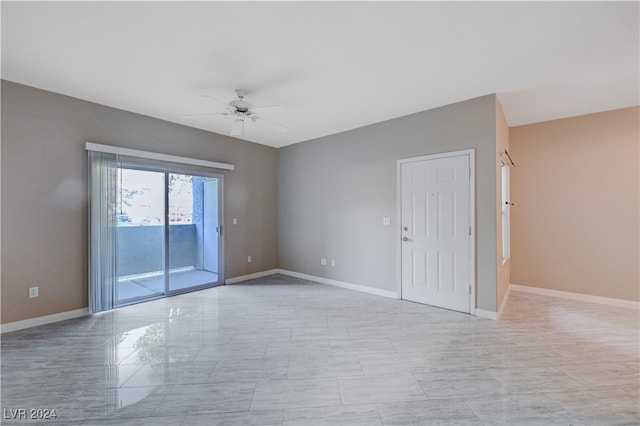 unfurnished room featuring ceiling fan