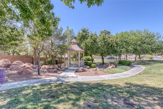 view of community with a gazebo and a lawn